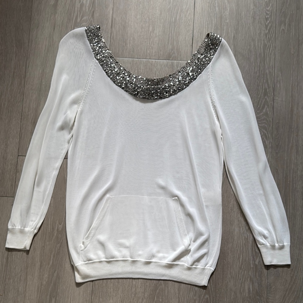 Elegant White Top with Silver Accents